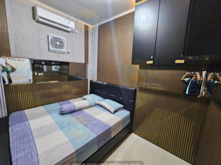    tampilan kamar tidur keluarga homestay joia pangandaran